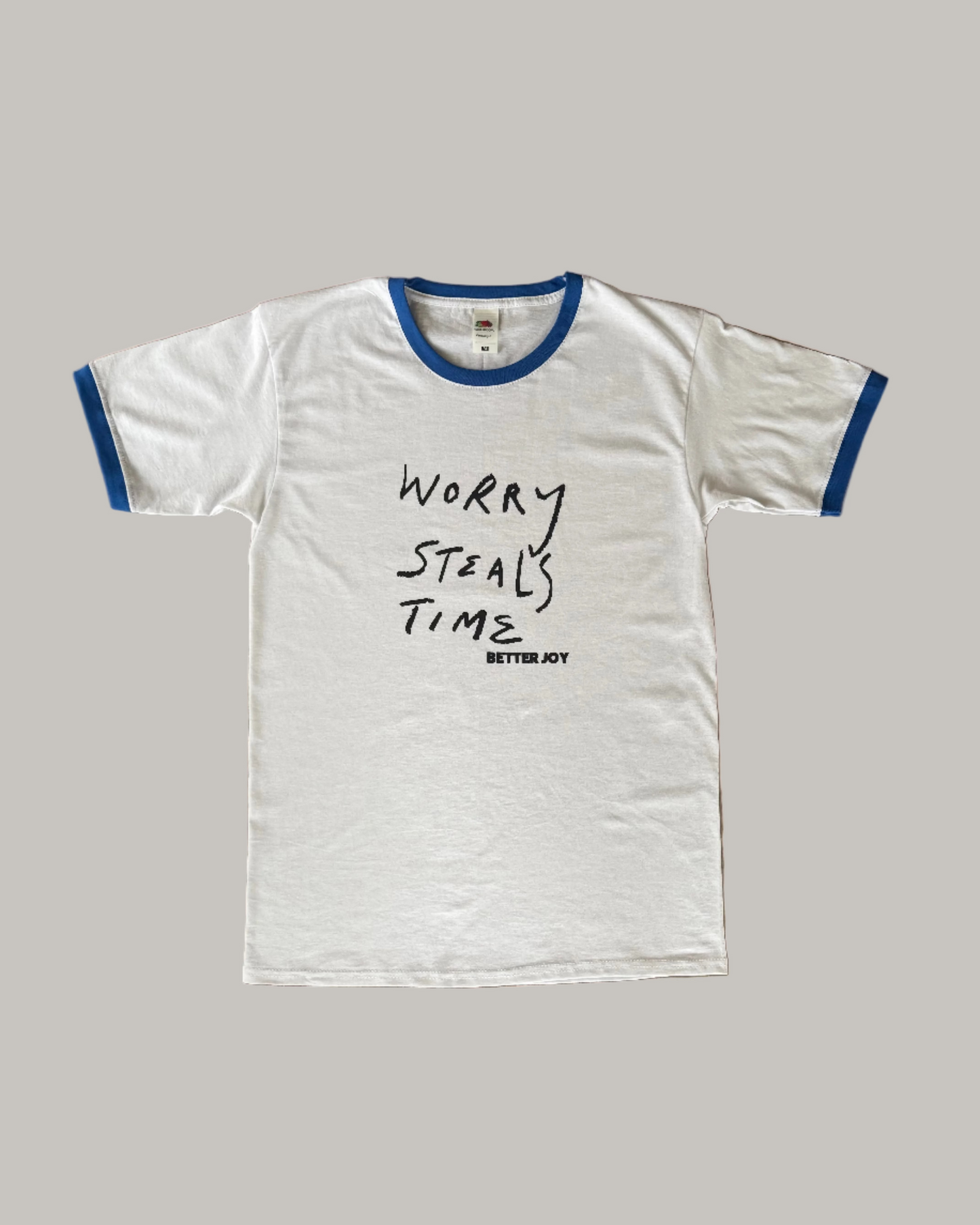 worry steals time ringer tee